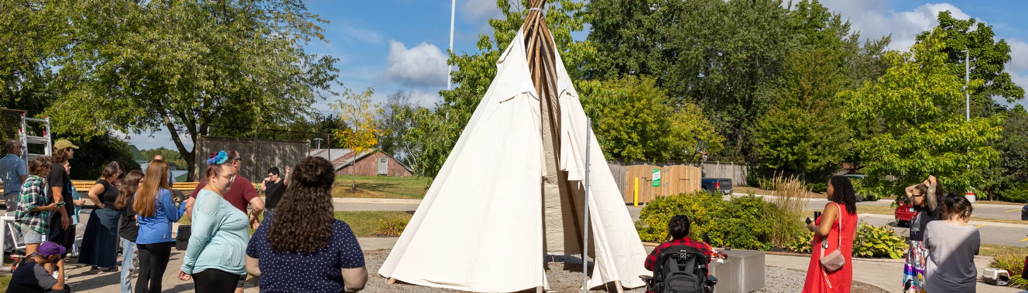 Trent University Durham First Peoples House of Learning students and staff putting up Tipi. 