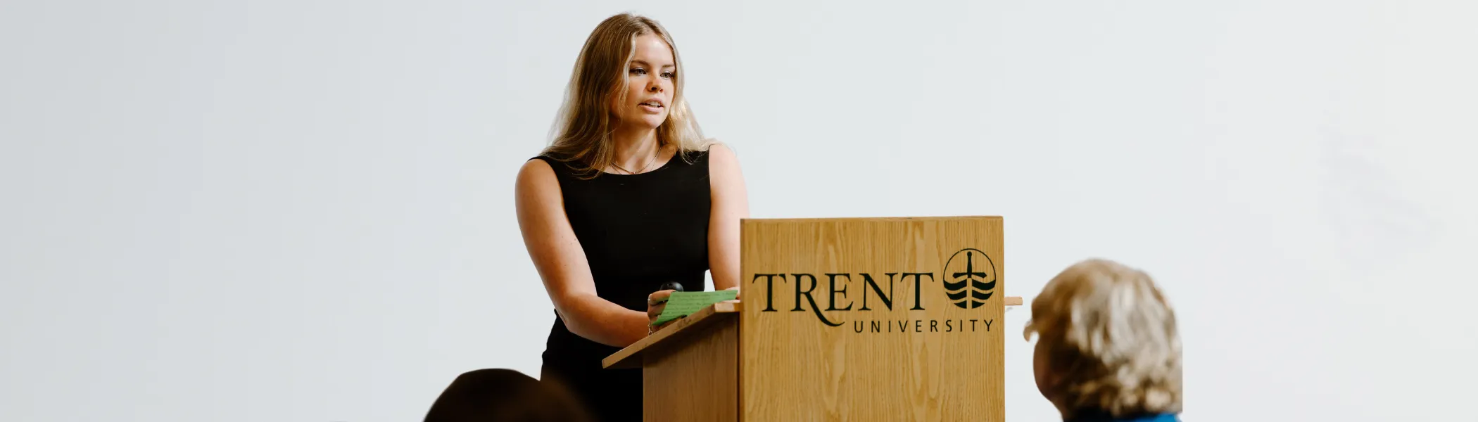 Trent University student giving a presentation to their class.
