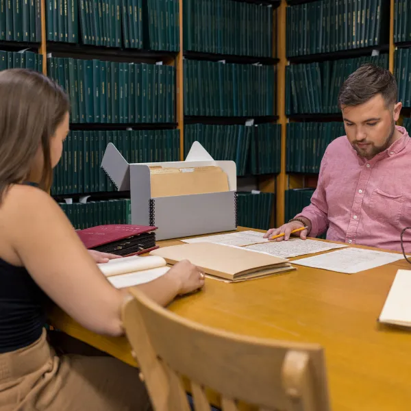 Trent University students doing research in the archives.