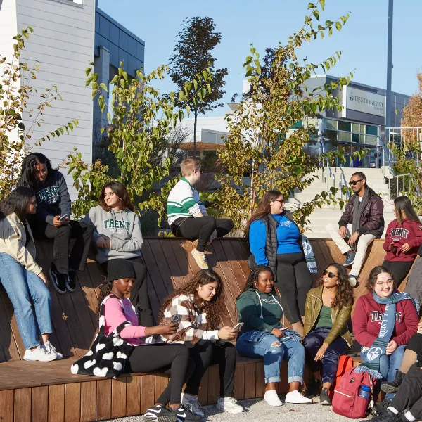 Group of Trent Durham students, talking together outside.