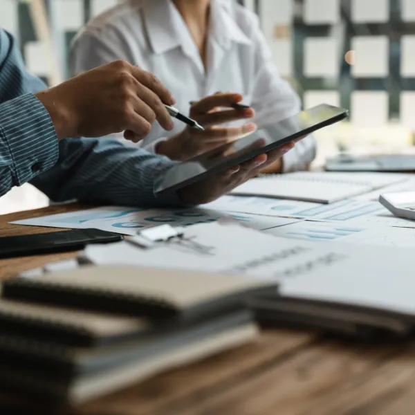 Marketing meeting to analyze and discuss the marketing reports.