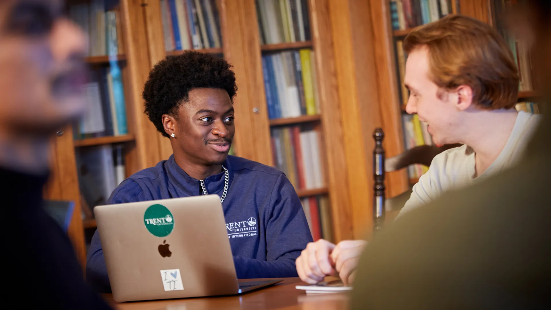 Students discussing in a seminar room