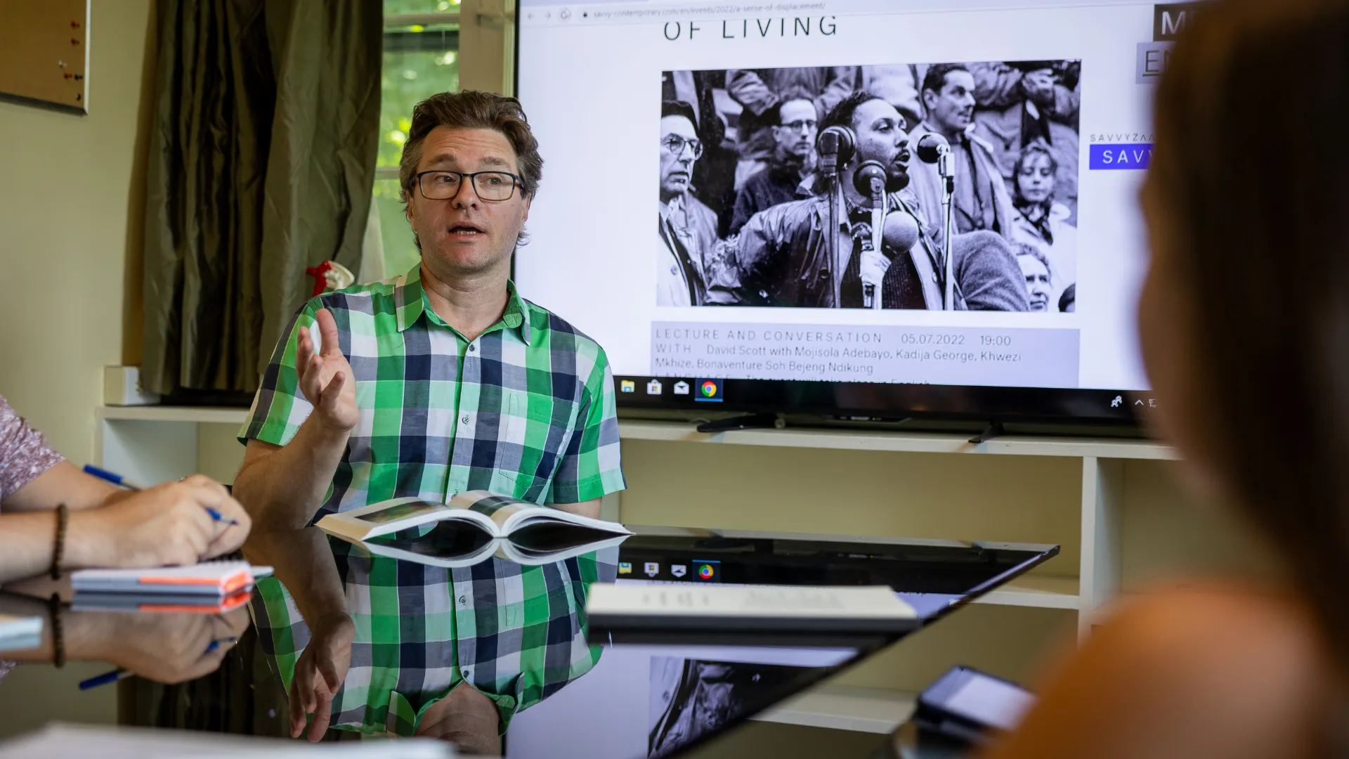 A Trent professor gives a lecture to students in a seminar room