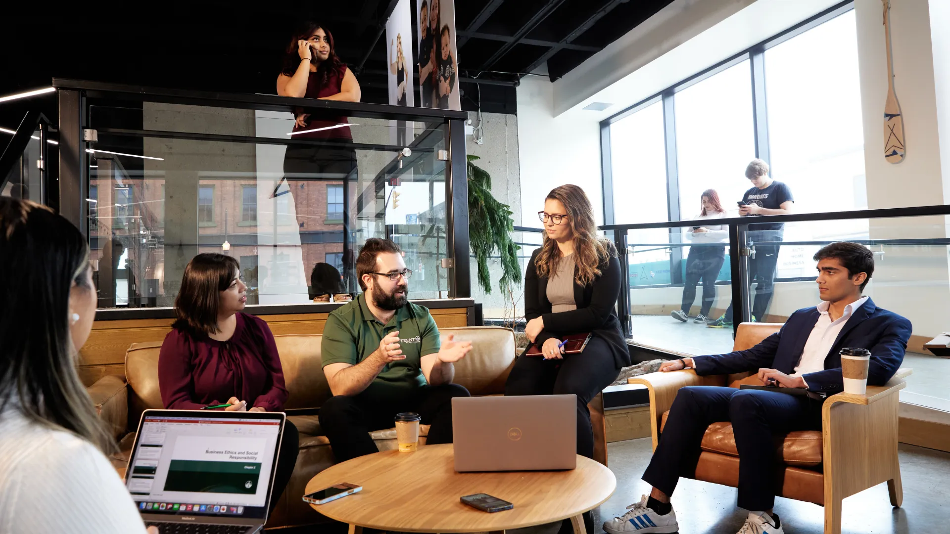 Trent students sitting around a table