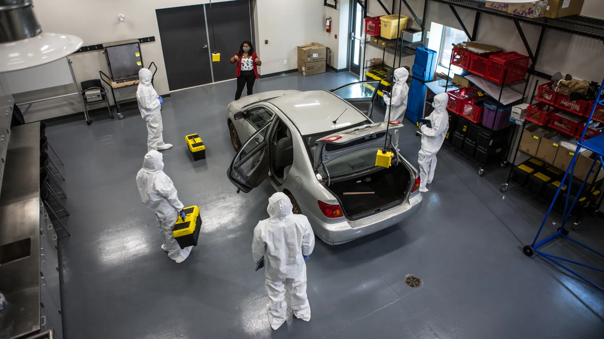 Forensic Science students examine a simulated crime scene