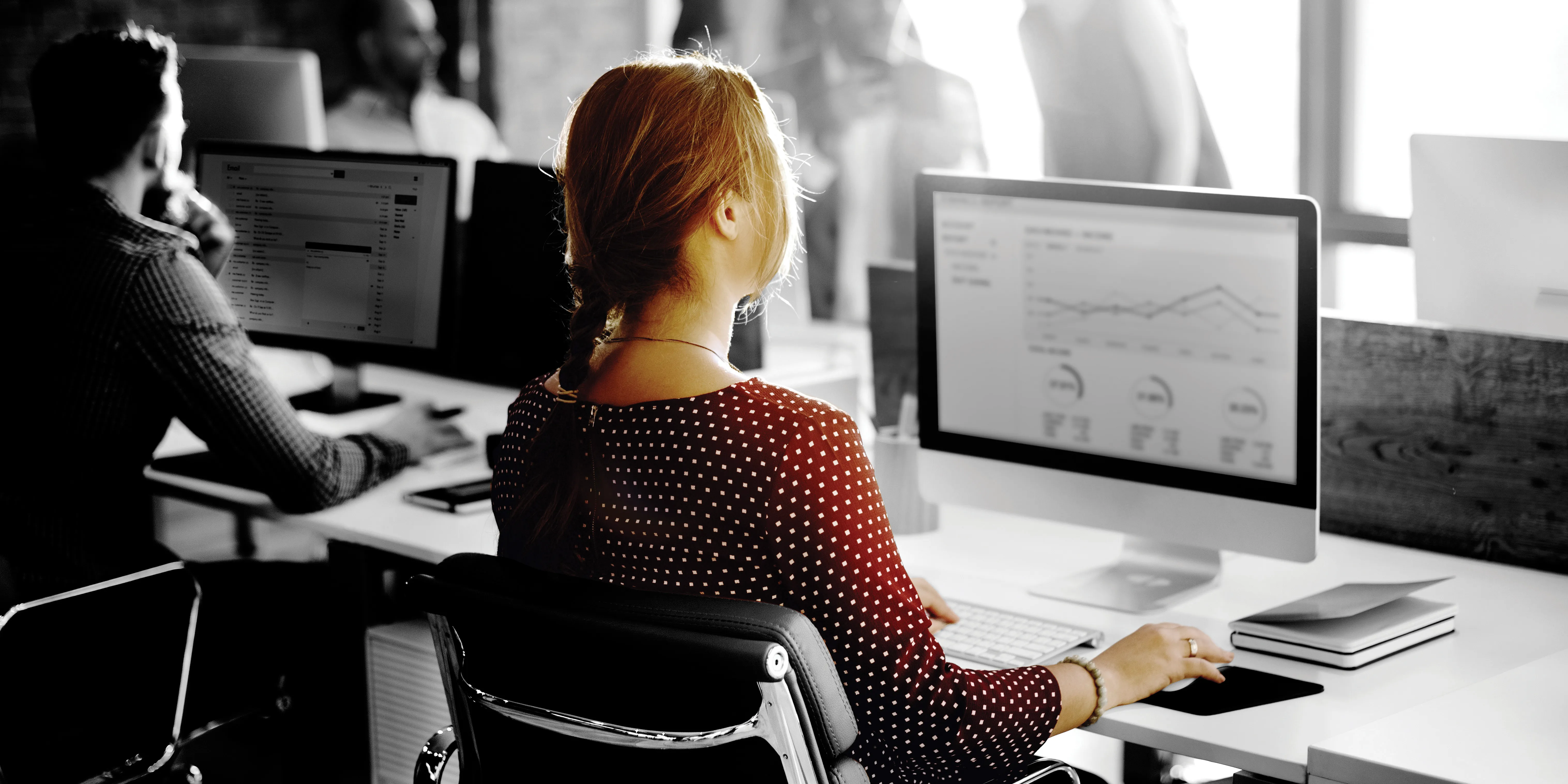 Woman sitting at computer