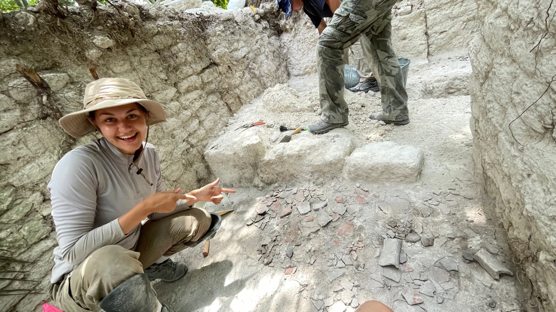 Student at a field school dig