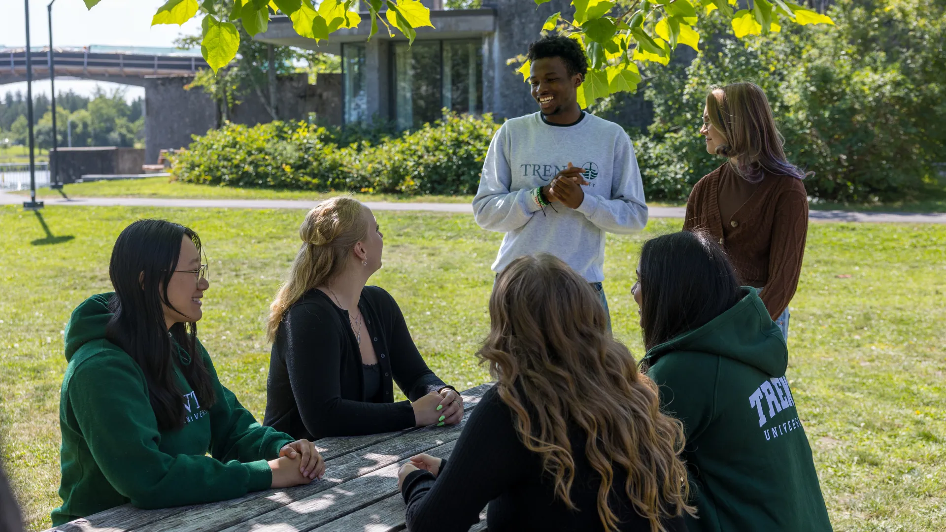 Group of students talking outside.