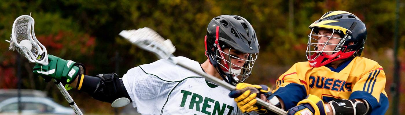 Two athletes fighting for a point in Lacrosse