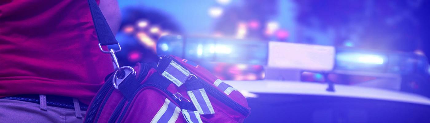 paramedic walking towards emergency vehicle