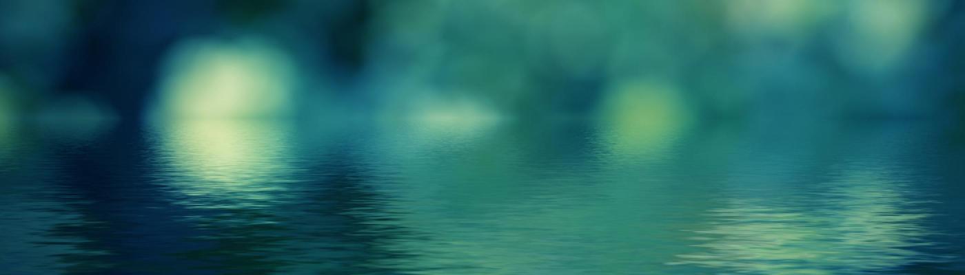 Water with light reflecting in blue tones