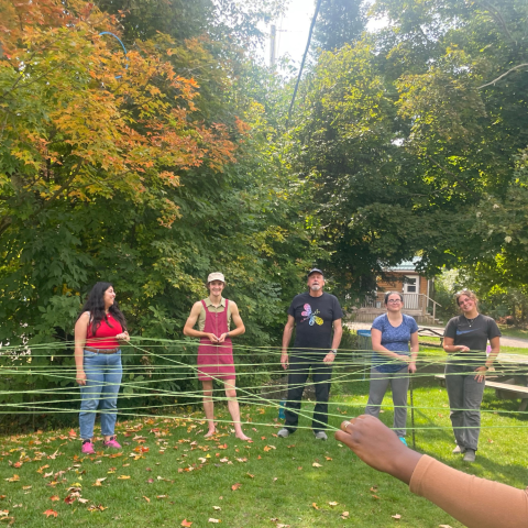 students doing team building exercises