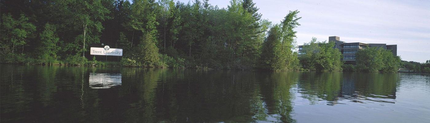 Sign along the Otonabee River that says &quot;Trent University&quot;