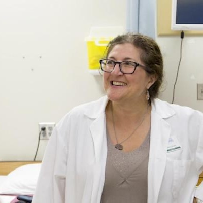 A group of nursing students talking to each other