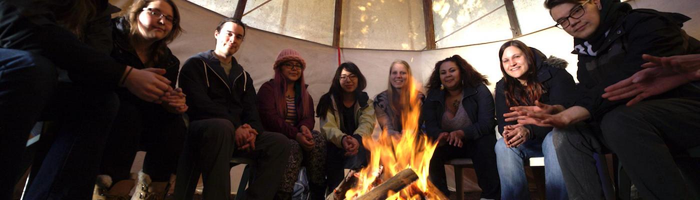 A gathering of people in the tipi