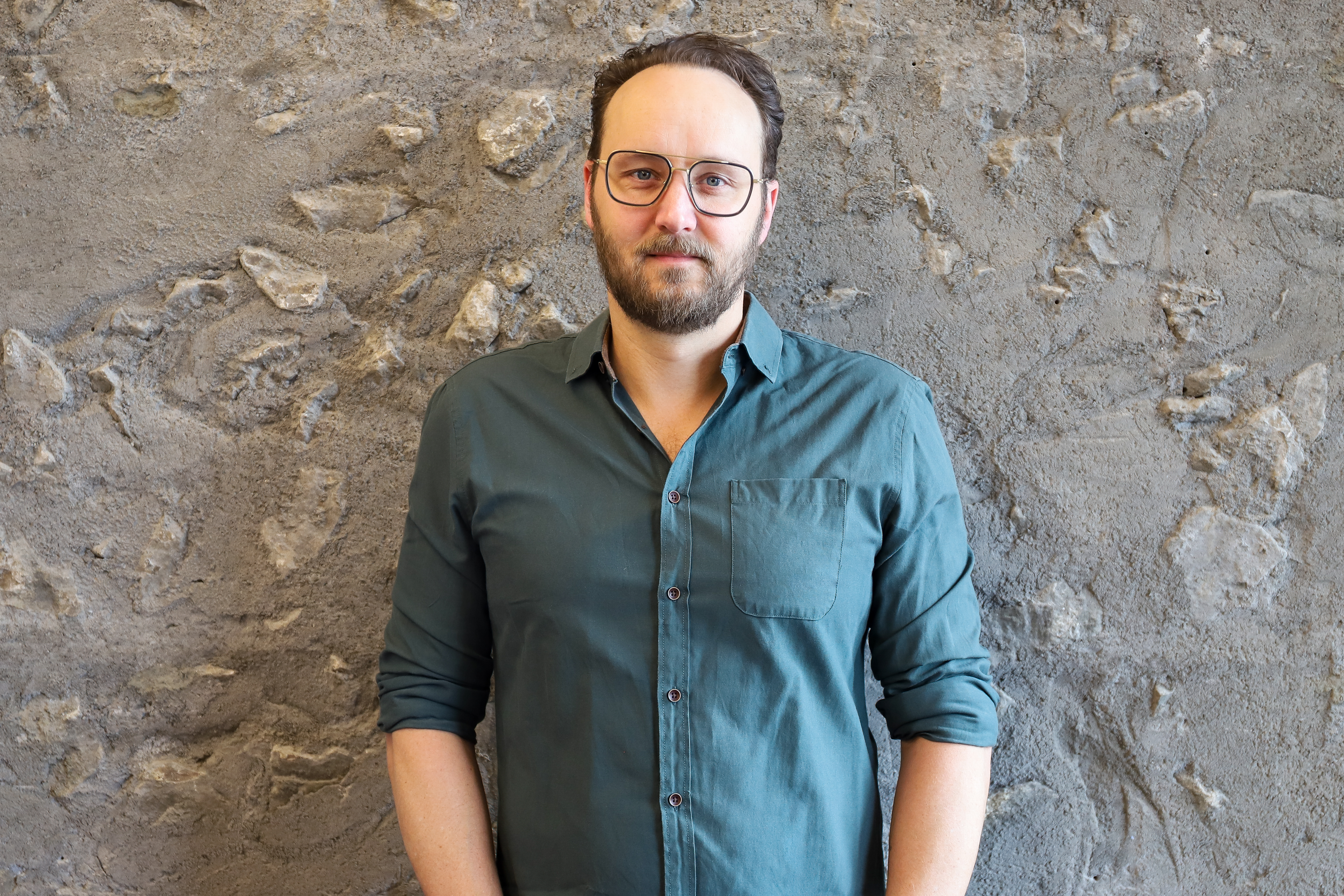 Dr. Loeb staring at the camera and smiling