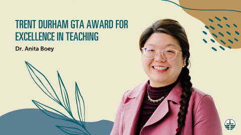 Anita Boey smiling on a poster for her award