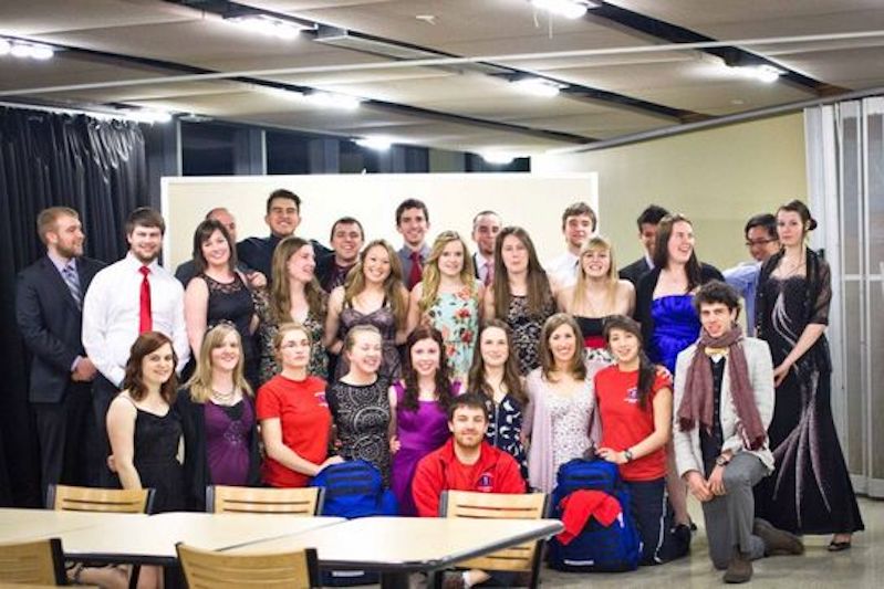 A picture of TUEFRT Team Members from 2012 - 2013 at an event