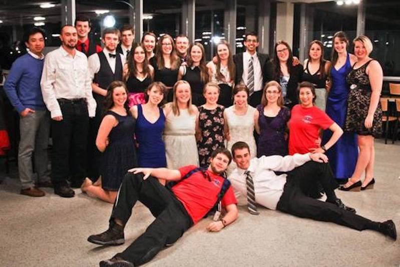 A picture of TUEFRT Team Members from 2013 - 2014 at an event