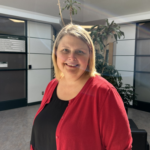 Woman standing smiling